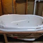 Picture of a bathtub being installed
